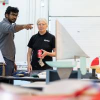 Dr. Manoharan and Dr. Fleischmann discuss the boats